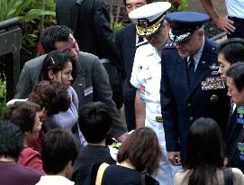 Kin of Ehime Maru missing arrive in Hawaii+